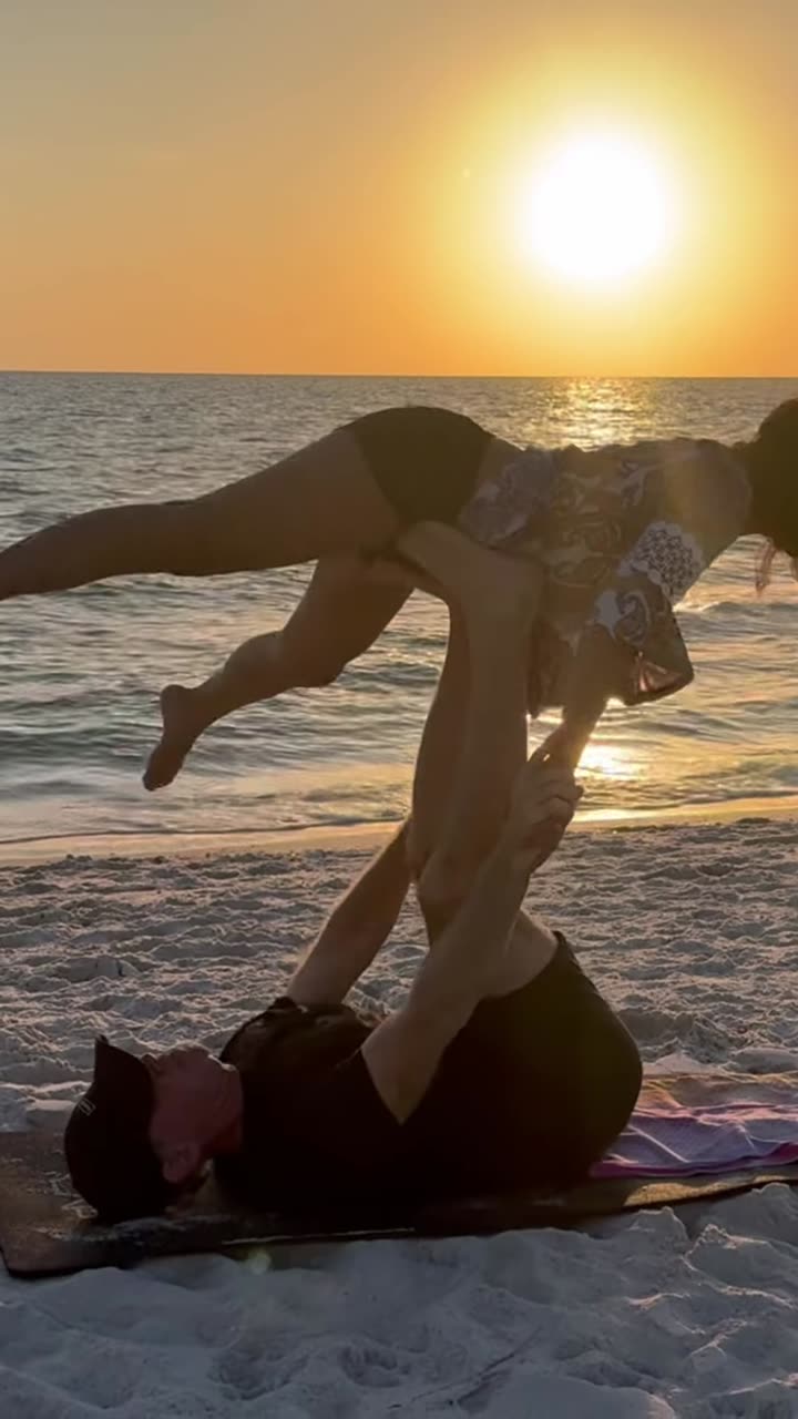 Acro yoga on the beach